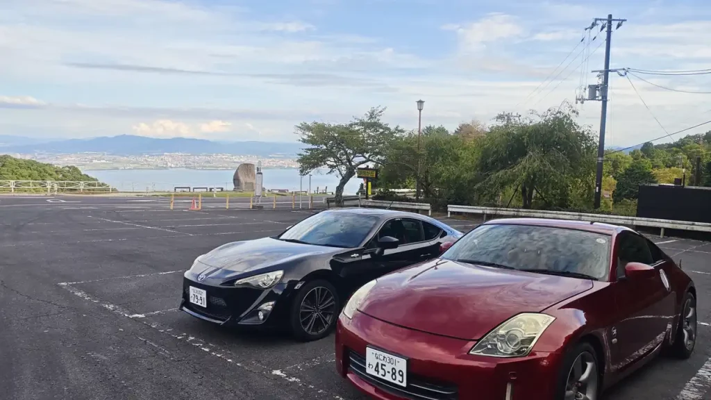 2 sports car facing the sea, Kyoto